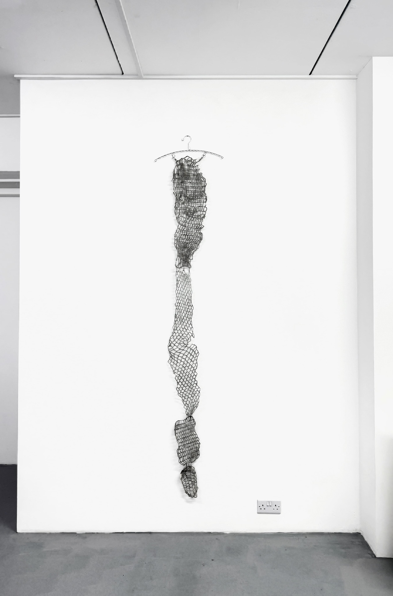 Minyu Zhu, London, United Kingdom. “Interweave 02,” hand-knitted textile, stitched fabric, thread, steel.