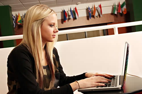 Image of students on laptop watching Tegrity session.