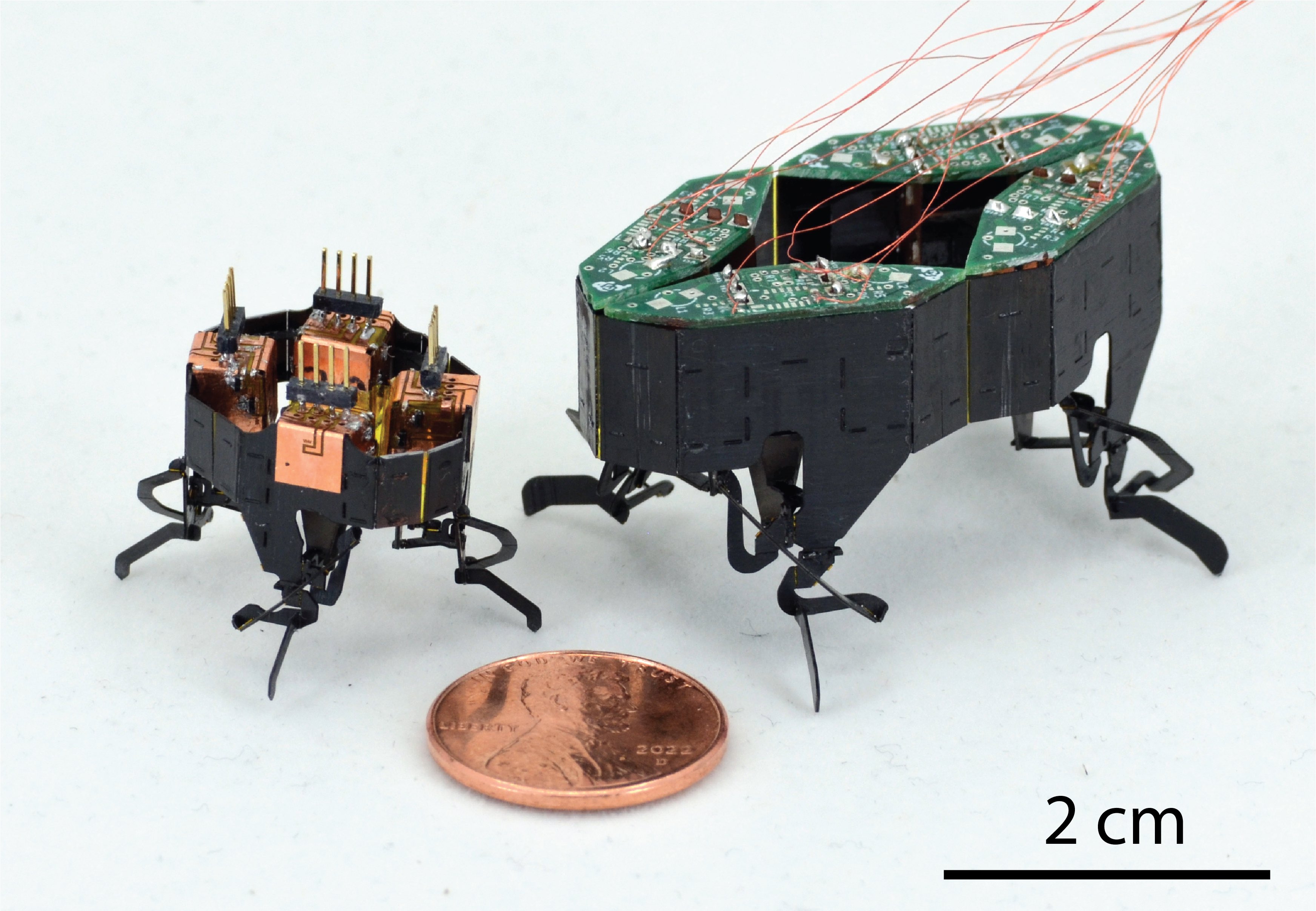 2 robots compared to a penny