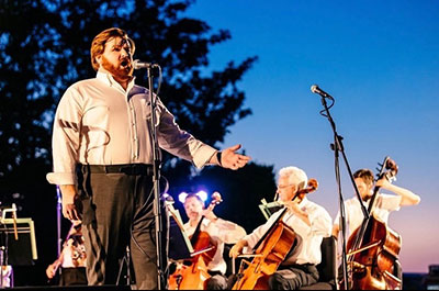 Bowles performing at the Dallas Opera's Arboretum showcase.