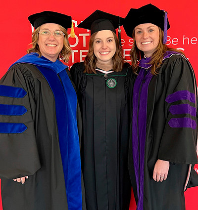 KateLynn Albers with fellow professors